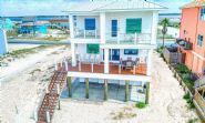 Modern coastal piling home on Navarre Beach by Acorn Fine Homes - Thumb Pic 5