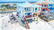 Modern coastal piling home on Navarre Beach by Acorn Fine Homes - Thumb Pic 4
