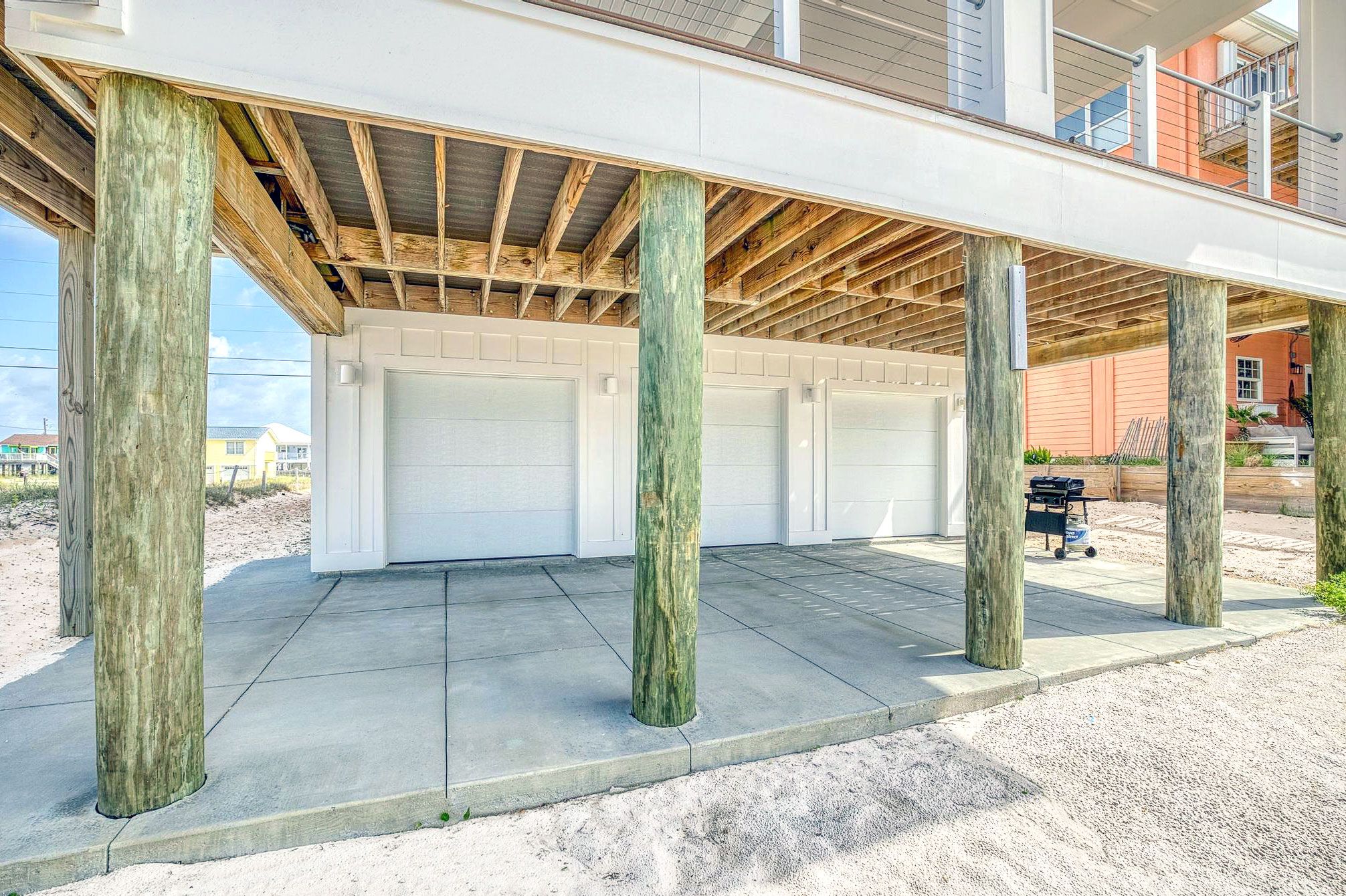 Modern coastal transitional style piling home on Navarre Beach