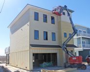 Davis modern coastal piling home on Navarre Beach by Acorn Fine Homes - Thumb Pic 7