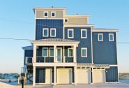 Dubois coastal transitional piling home on Navarre Beach by Acorn Fine Homes 