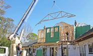 Seidel remodel in Pensacola by Acorn Fine Homes setting trusses - Thumb Pic 14