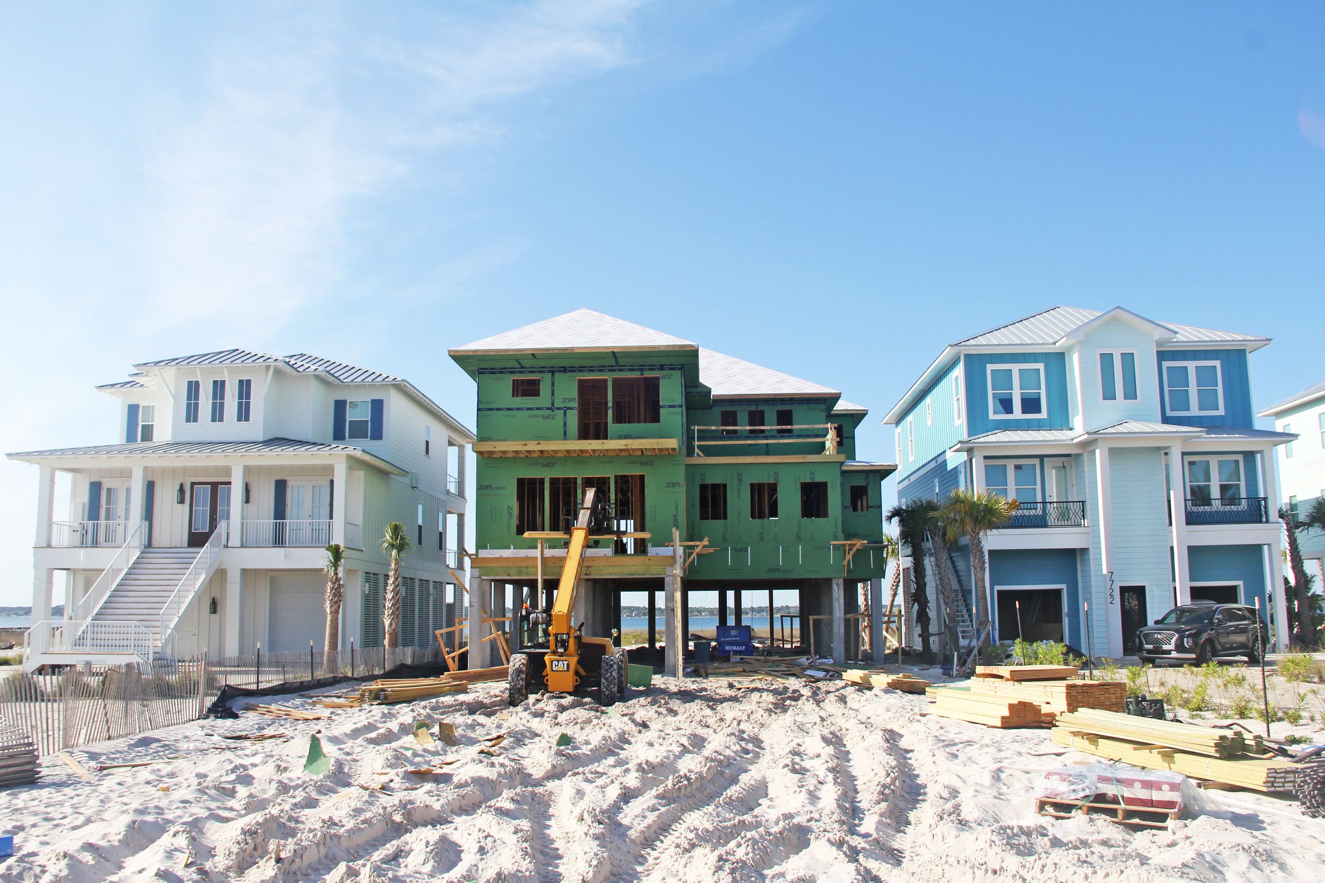 Modern piling home in Navarre by Acorn Fine Homes