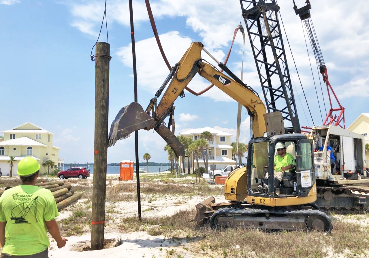 Walker piling home in Navarre Beach by Acorn Fine Homes