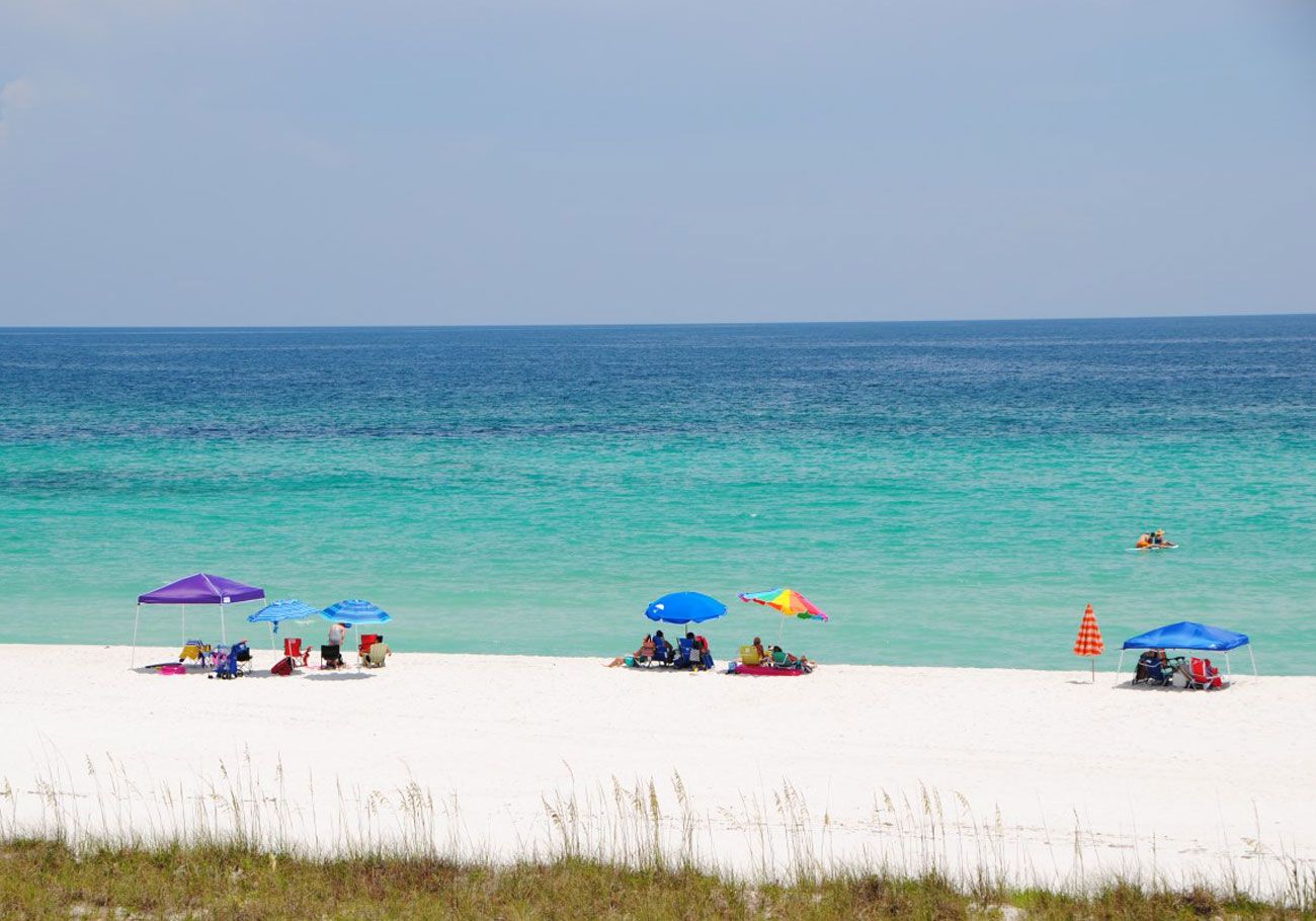 Antinnes concrete piling home on Navarre Beach by Acorn Fine Homes