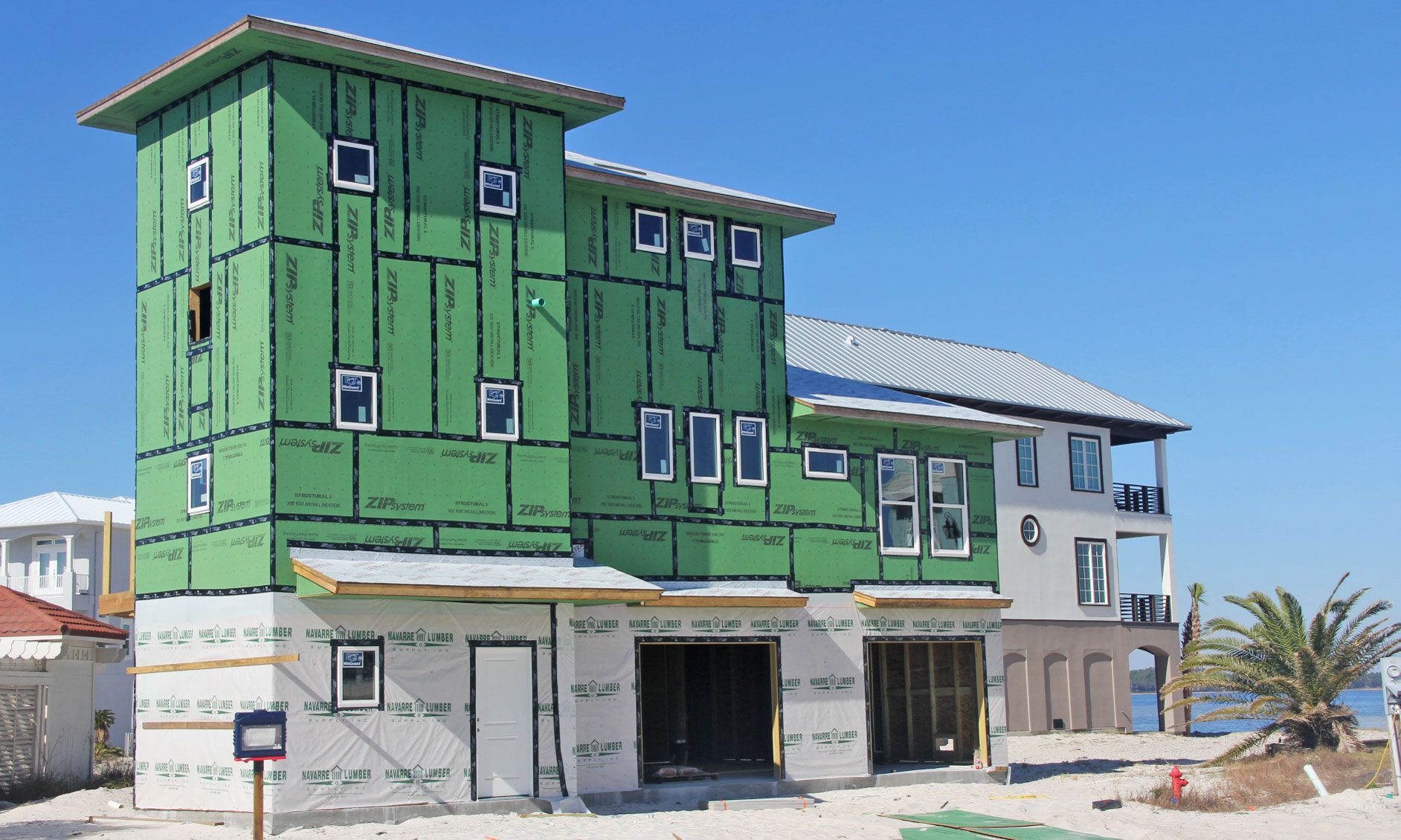 Slone piling home on Navarre Beach by Acorn Fine Homes