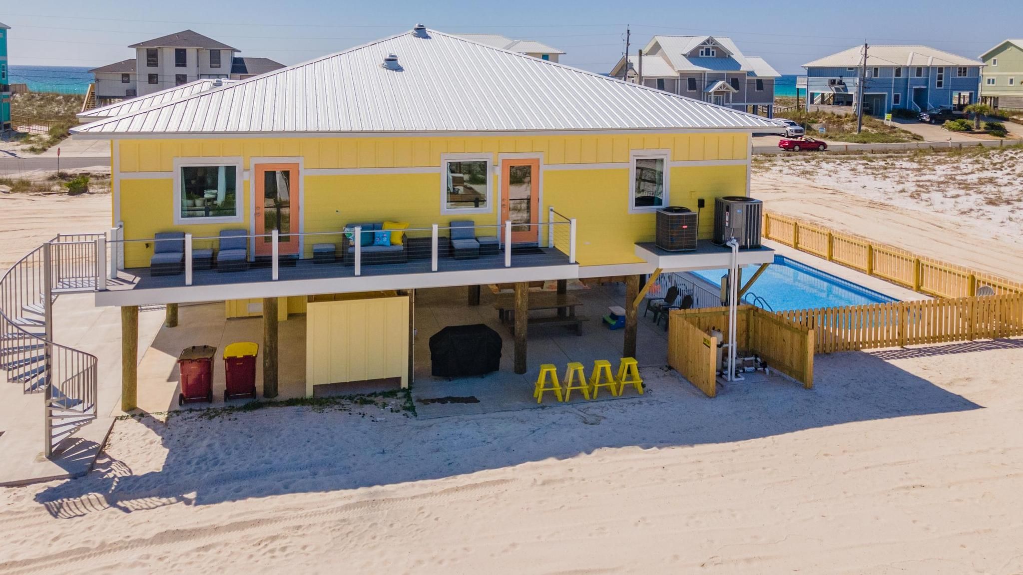 Gomel beach rental piling home on Navarre Beach by Acorn Fine Homes