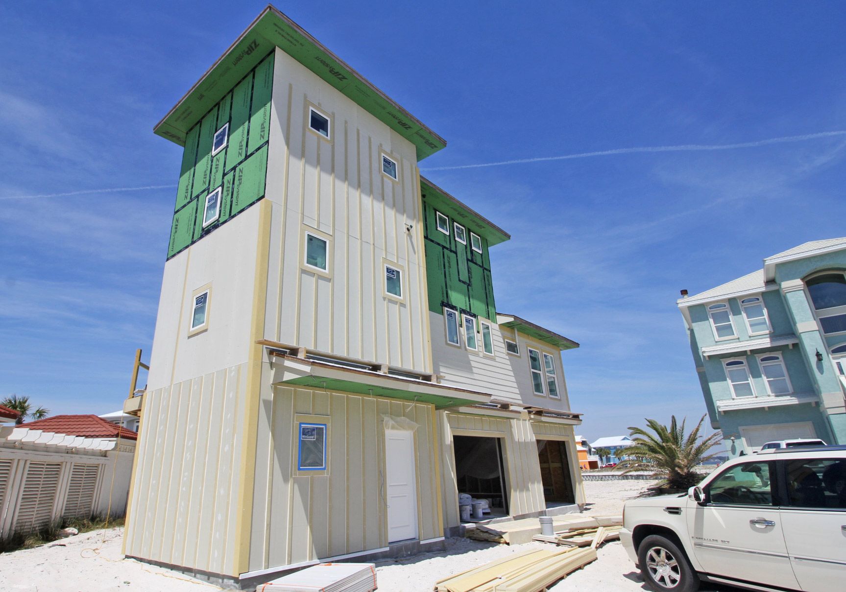 Slone modern coastal piling home on Navarre Beach by Acorn Fine Homes