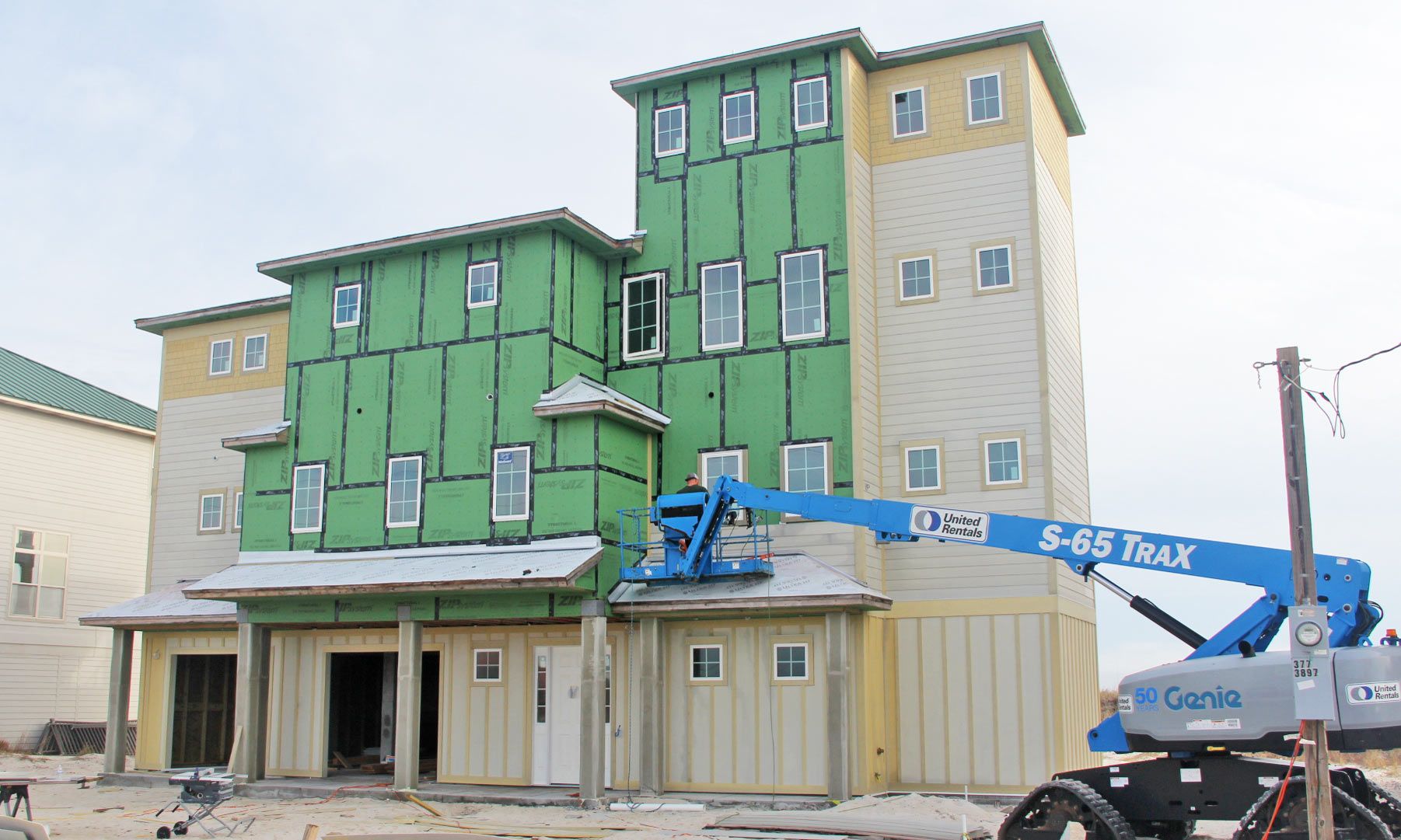 Antinnes concrete piling home on Navarre Beach by Acorn Fine Homes