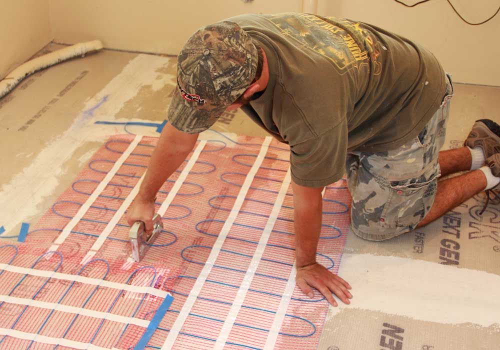 Radiant floor heating grid by Acorn Construction