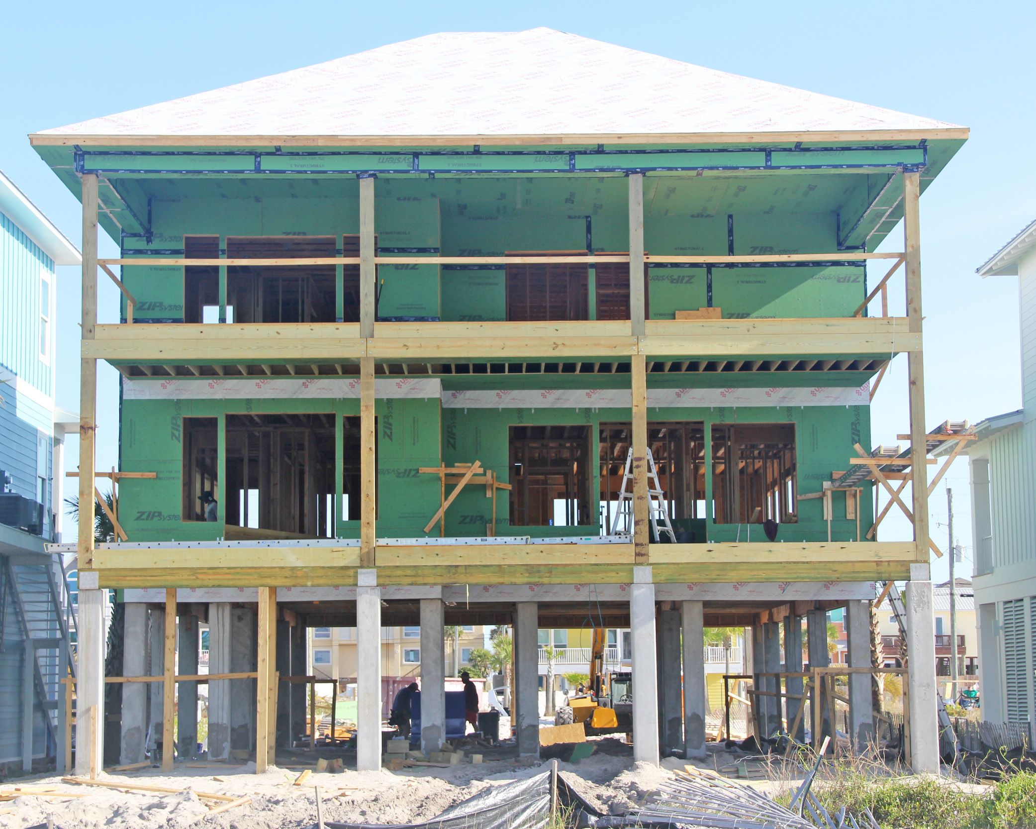 Modern piling home in Navarre by Acorn Fine Homes