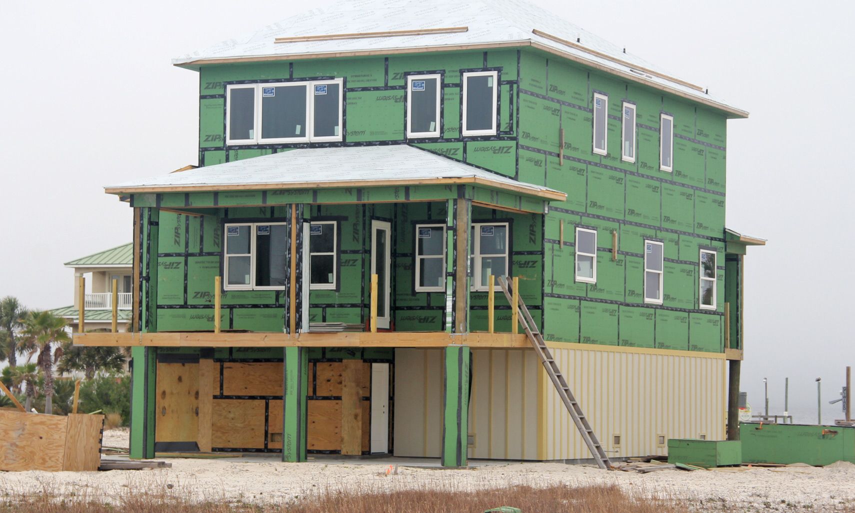 Walker piling home in Navarre Beach by Acorn Fine Homes