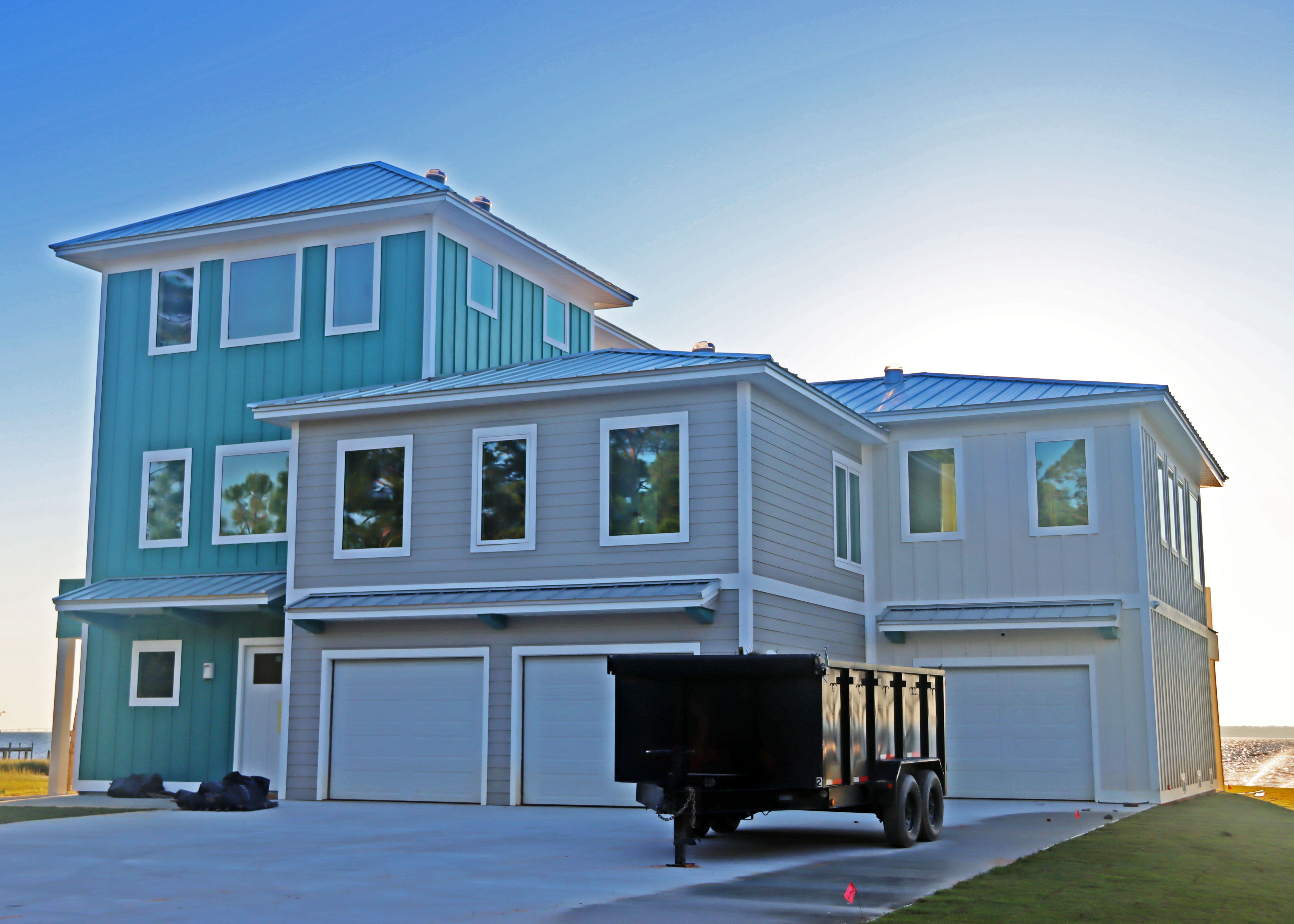 Modern piling home in Navarre, Gulf Breeze, Milton by Acorn Fine Homes