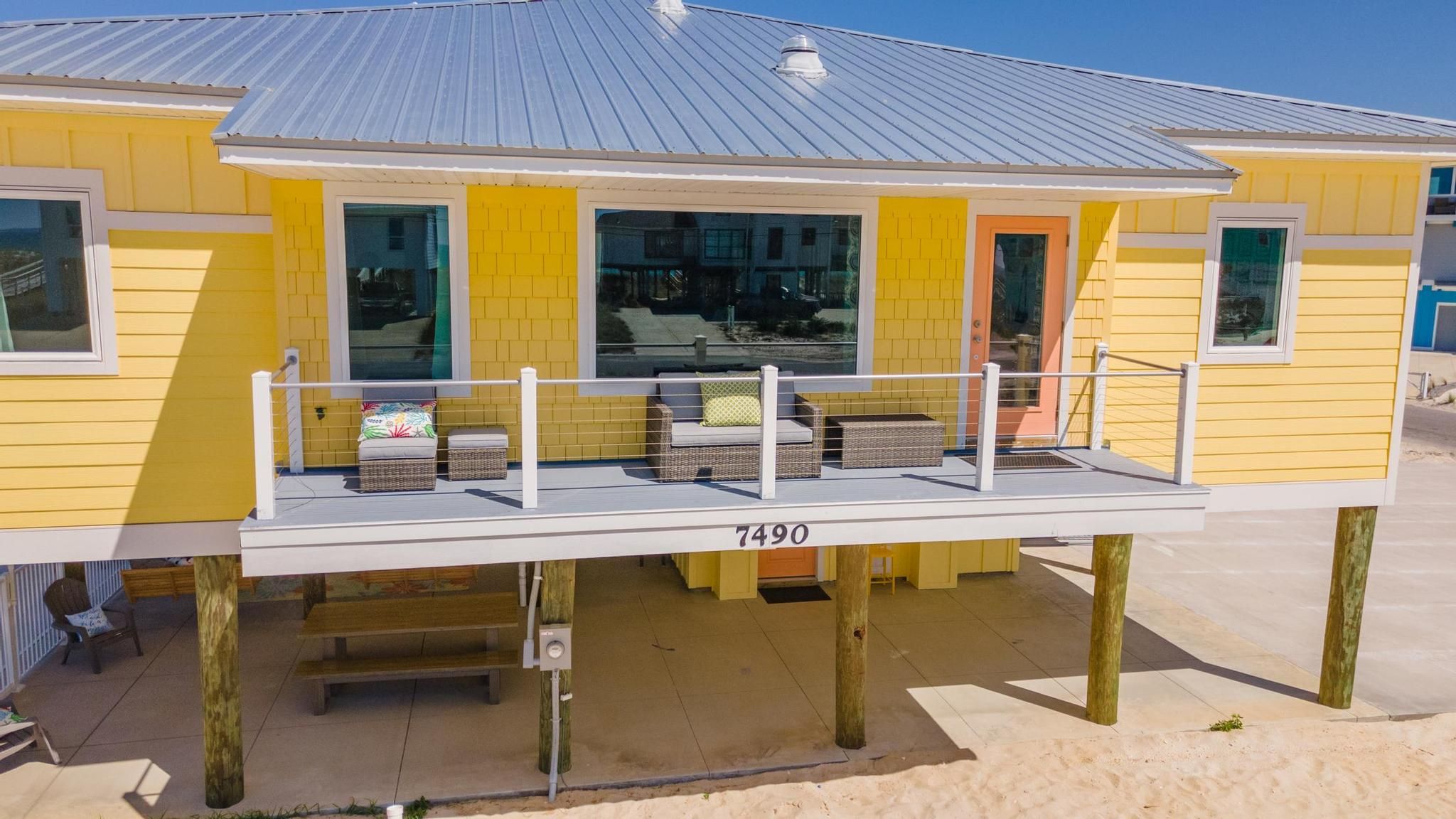 Gomel beach rental piling home on Navarre Beach by Acorn Fine Homes