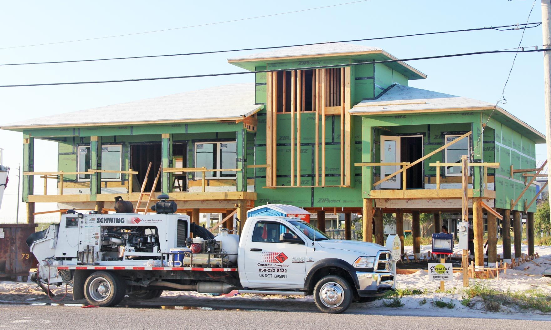 Moreland piling home on Navarre Beach by Acorn Fine Homes