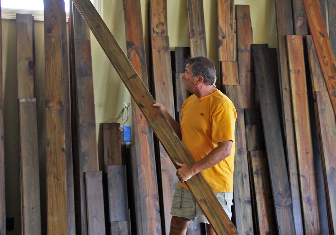 reclaimed heart pine floors in Navarre, Florida by Acorn Construction