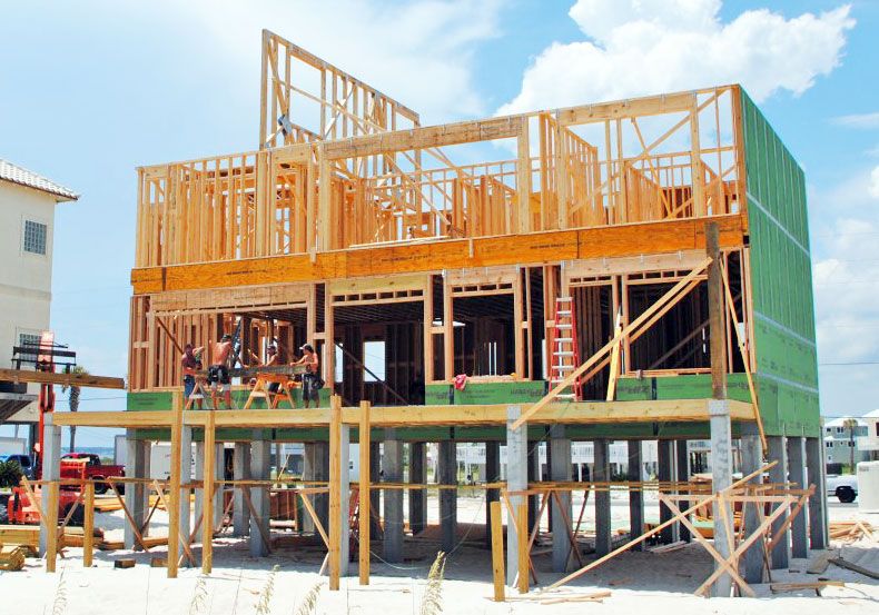 Antinnes concrete piling home on Navarre Beach by Acorn Fine Homes