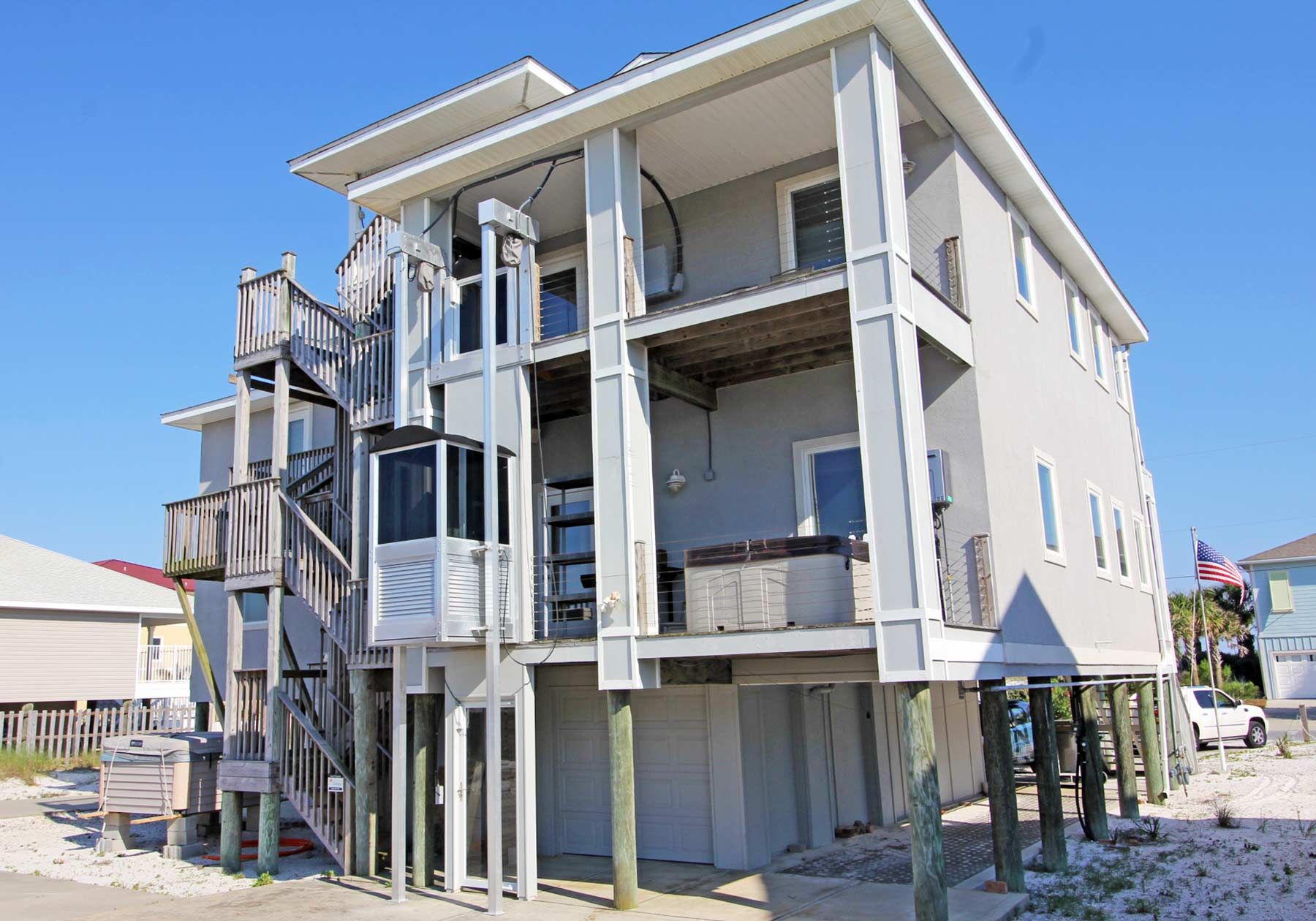 Exterior elevator by Acorn Fine Homes