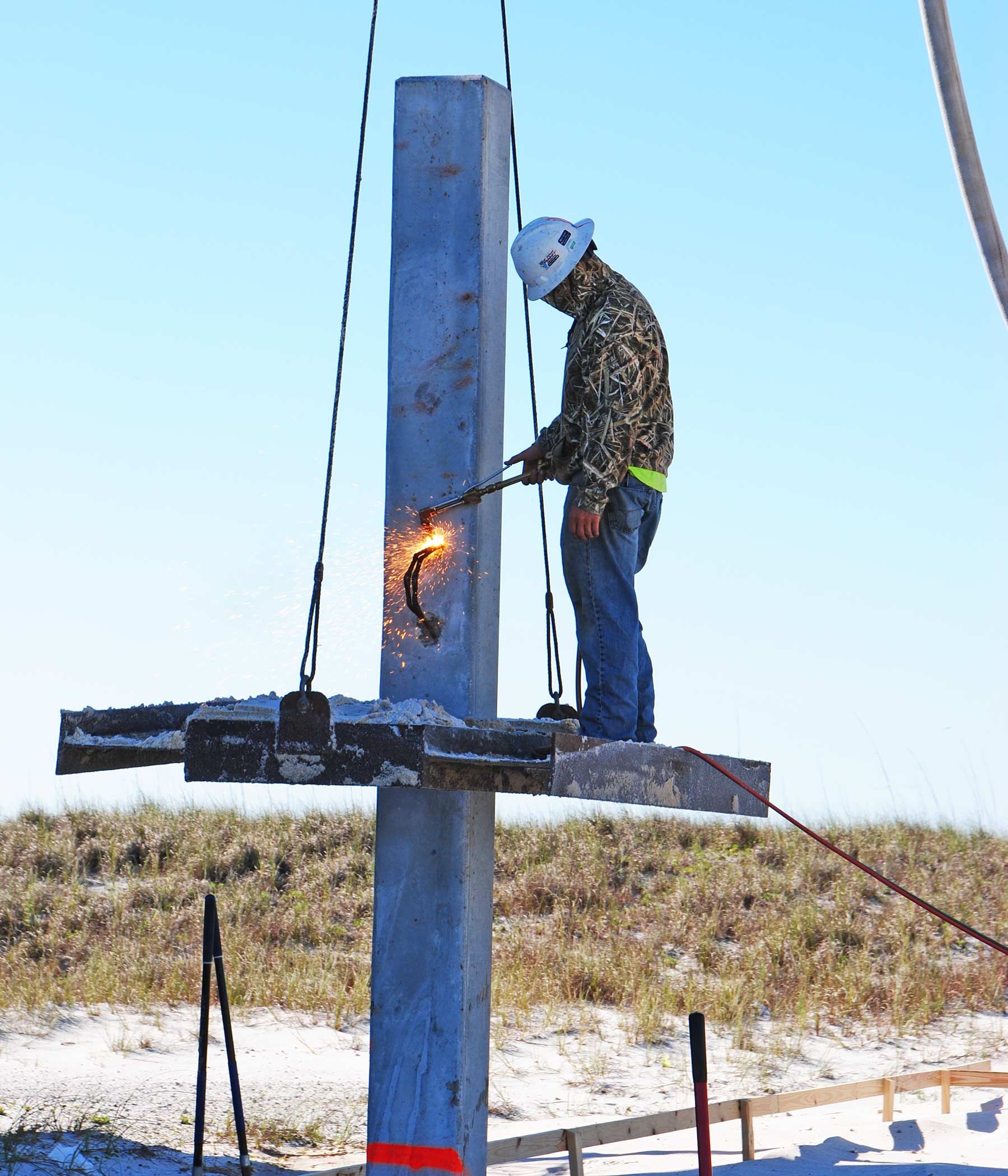 Antinnes piling home on Navarre Beach by Acorn Fine Homes