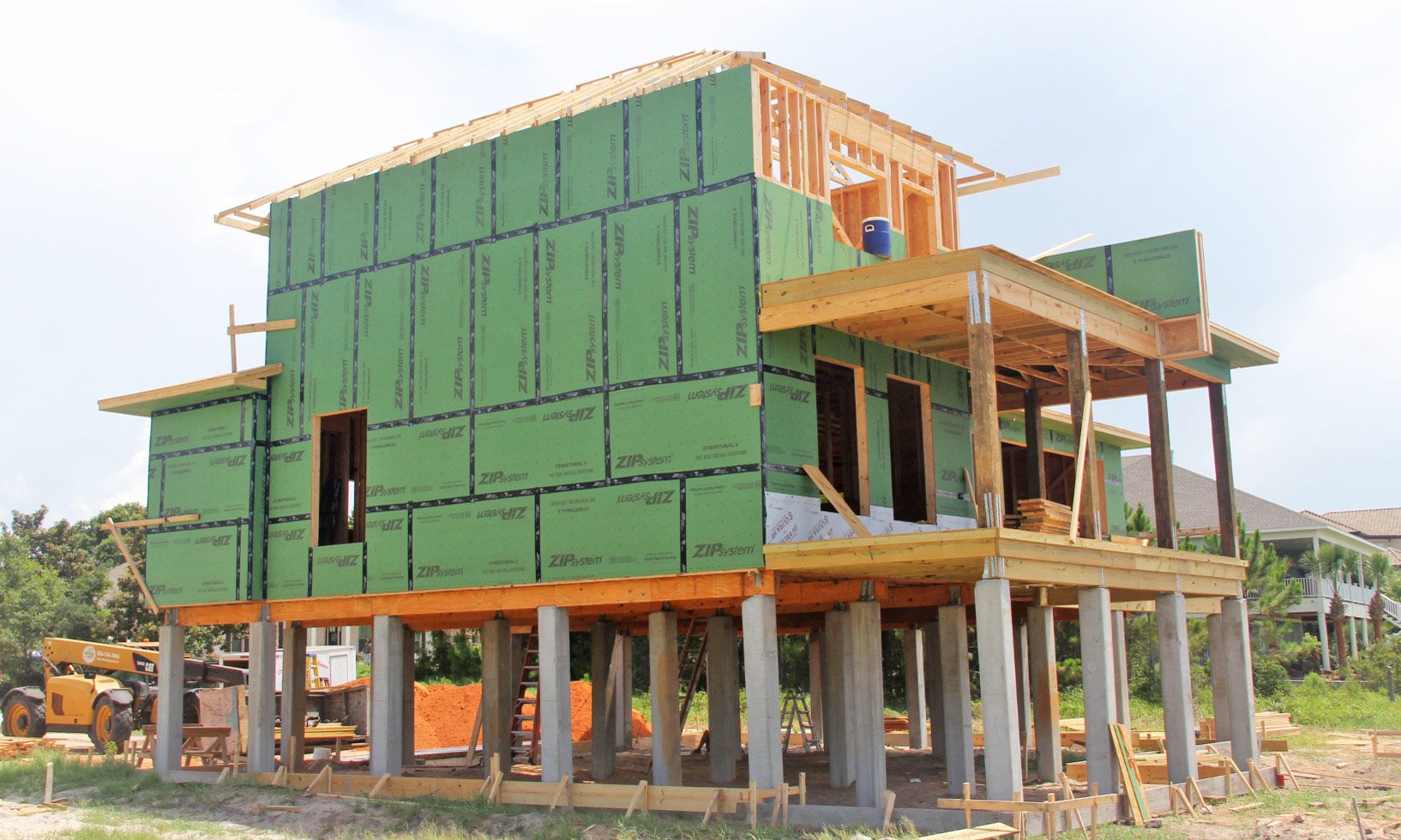 Modern piling home in Navarre by Acorn Fine Homes