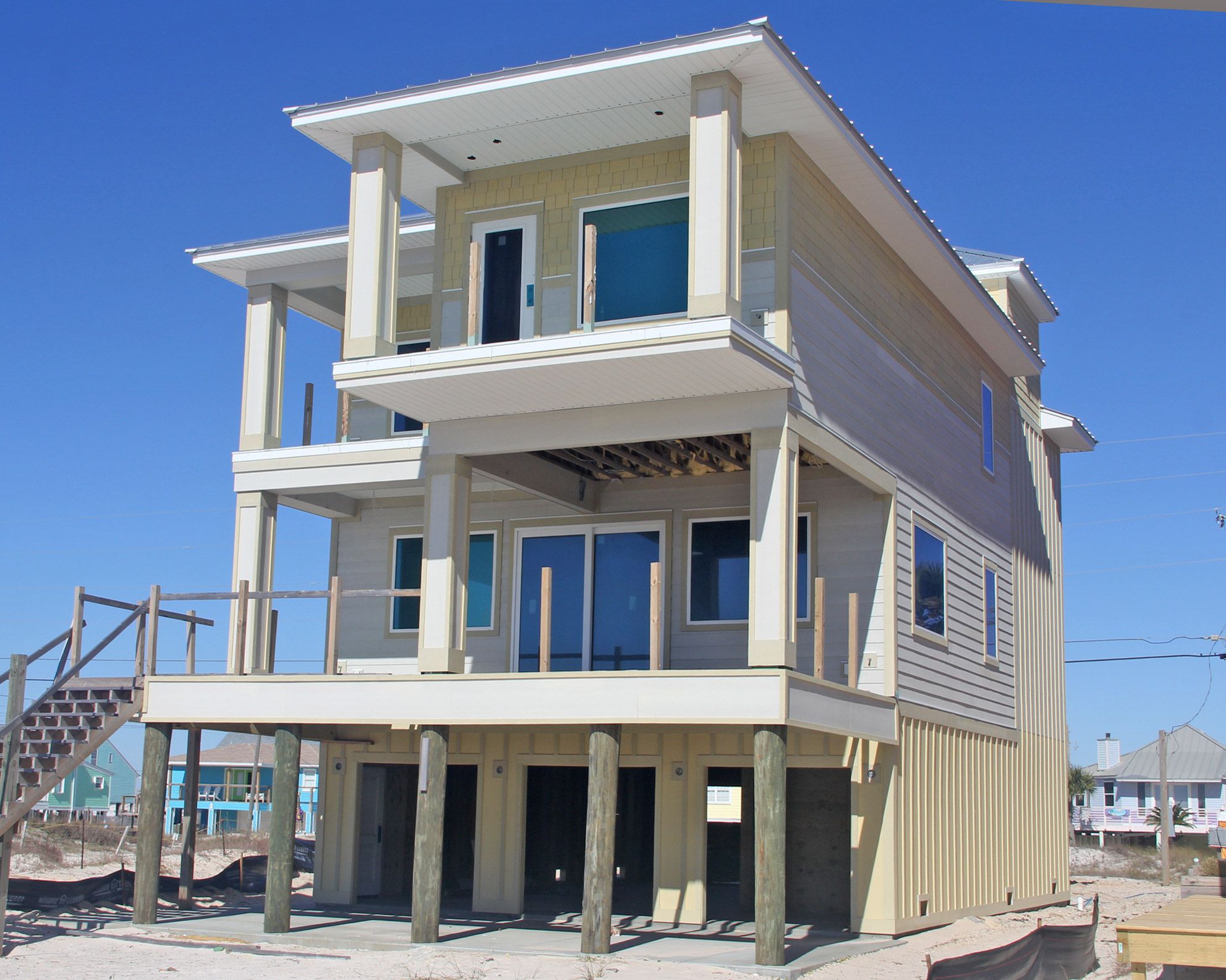 Smith coastal transitional style piling home on Navarre Beach