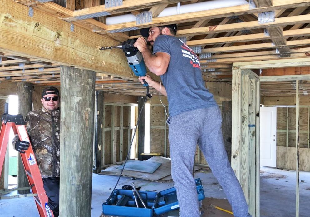 Walker piling home in Navarre Beach by Acorn Fine Homes